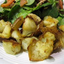 Twice-Roasted Potatoes With Onion, Herbs and Chilli recipe
