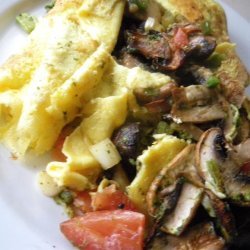 Garlicky Mushroom Masala Omelet recipe