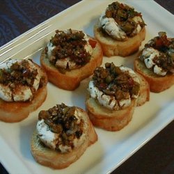 Marinated Goat Cheese Rounds With Crostini recipe