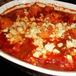Kounoupithi (Baked Cauliflower With Feta and Tomato Sauce) recipe