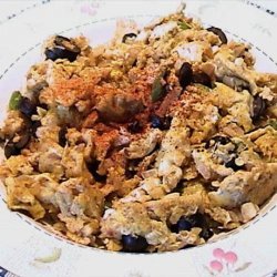 Scrambled eggs and olives recipe