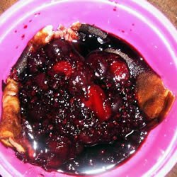 Skillet Custard with Berry Sauce recipe