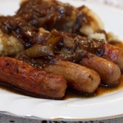 Sausages With Mashed Potatoes, Beer and Onion Gravy and Mustard recipe