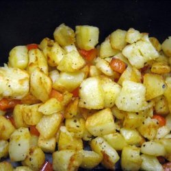 Pan-Browned Potatoes With Red Pepper and Whole Garlic recipe