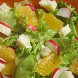 Spring Greens With Orange Curry Dressing recipe