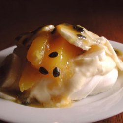 Pavlovas With Lemon Curd and Tropical Fruit recipe