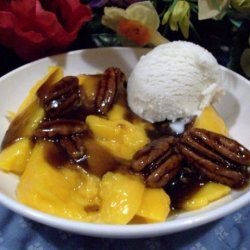 Mangoes Foster With Creme Fraiche (By Bobby Flay) recipe