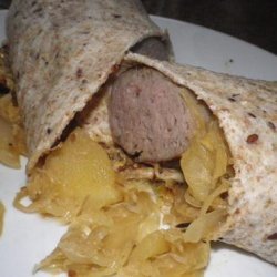 Beer-Bathed Brats With Sauerkraut and Apples recipe
