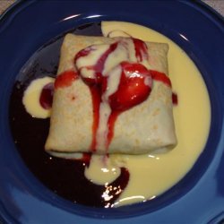Three Berry Crepes with Creme Anglaise and Strawberry Sauce recipe