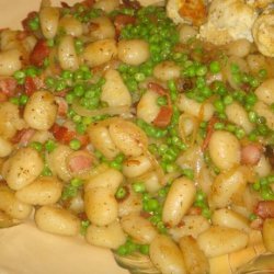 Pan-Fried Gnocchi With Bacon, Onions, & Peas recipe