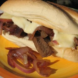 Philly Cheesesteaks With Melted Fontina and Sauteed Red Onions recipe