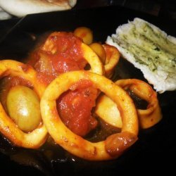 Squid Stewed With Tomatoes, White Wine and Black Olives recipe