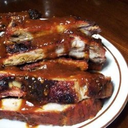 Smoky Sweet Spareribs With Sauce and Beans recipe
