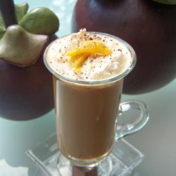 Orange Coffee Topped With Honey Nougat Chocolate And Orange Peel recipe