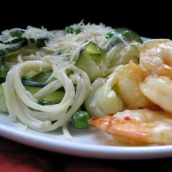 Spaghetti With Peas, Zucchini Ribbons, and Garlic Shrimp recipe