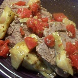 Roast Lamb With Tomatoes and Artichoke Hearts recipe