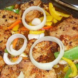Pork Chops Garnished With Peppers & Onions recipe