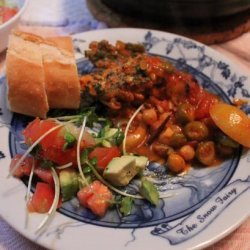 Spiced Chicken Thighs in Tomato Broth With Olives and Chickpeas recipe