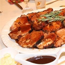 Rosemary-Scented Pork Loin Stuffed With Roasted Garlic, Dried Apricots and Cranberries and Port Wine Pan Sauce recipe