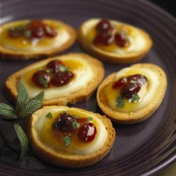 Crème De Brie® Mango-Cranberry Crostini recipe