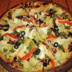 Artichoke, Pesto & Sun-Dried Tomato Pizza With Three Cheeses recipe