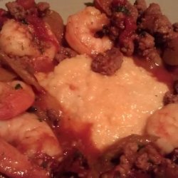 Shrimp and Grits With Roasted Tomato, Fennel, and Sausage recipe