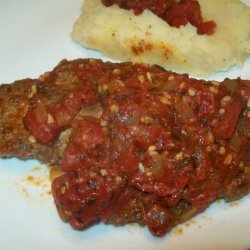Greek Keftethes Covered in Tomato Sauce recipe