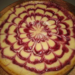 Vanilla Cheesecake With Chocolate Hazelnut Crust and Raspberries recipe