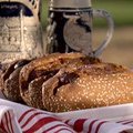 Wisconsin Beef and Cheddar Brats with Beer-Braised Onions (Sandra Lee) recipe