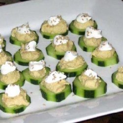 Cucumber Appetizer  Hummusyogurt And Sesame Seeds recipe