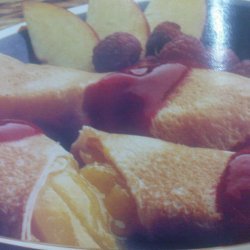 Peach Crepes With Raspberry Sauce recipe