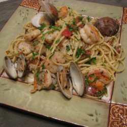 Seafood Linguine With Herbed Wine And Clam Broth recipe