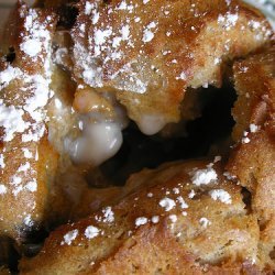 Luscious Cinnamon Raisin Bread Pudding With Warm B... recipe