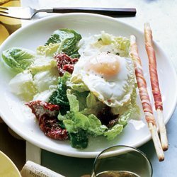 Fried-Egg Caesar with Sun-Dried Tomatoes and Prosciutto Breadsticks recipe