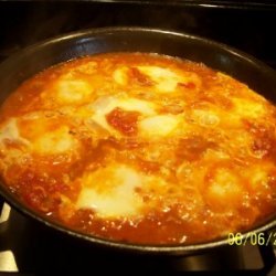 Poached Eggs In Tomatoes recipe