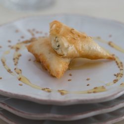 Phyllo Triangles Stuffed with Fresh Cheese (briouats bil jben) recipe