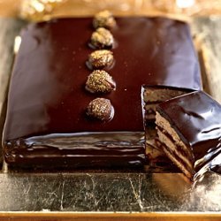 Dark Chocolate Caramel Cake With Gold Dusted Chest... recipe