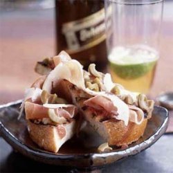 Grilled Bread with Serrano Ham, Manchego, and Olives recipe