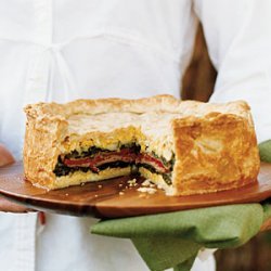 Layered Torta with Ham, Provolone, Spinach, and Herbs recipe