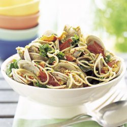 Grilled Clams with Spaghetti, Prosciutto, and Mixed Greens recipe