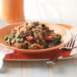 Sausage Risotto with Spinach and Tomatoes recipe