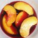 peaches, spiced, canned, heavy syrup pack, solids and liquids