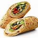 Ruby Tuesday turkey wrap no side sliced turkey spring mix tomato and dijon mustard sauce wrapped in a whole wheat tortilla Calories