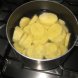 potatoes, frozen, whole, cooked, boiled, drained, with salt