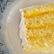 cake, yellow, commercially prepared, with vanilla frosting