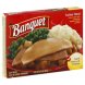 Banquet turkey and gravy with dressing meal with mashed potatoes and corn in seasoned sauce Calories