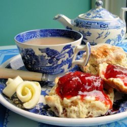 Traditional English Tea Time Scones With Jam and Cream