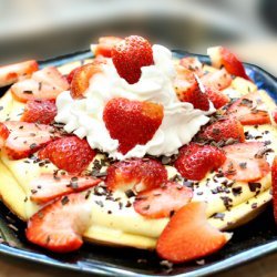 Strawberry-Topped Puffy Pancake With Creamy Orange Filling