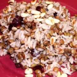 Rice, Lentils and Dried Cranberries Garnished With Pine Nuts