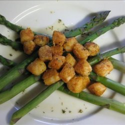 Scallops on Asparagus Spears With Wine Reduction
